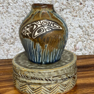 Small porcelain vase with hand carved Polynesian design and glazed with unique Huahine glazes found at the bottom of the lagoon.