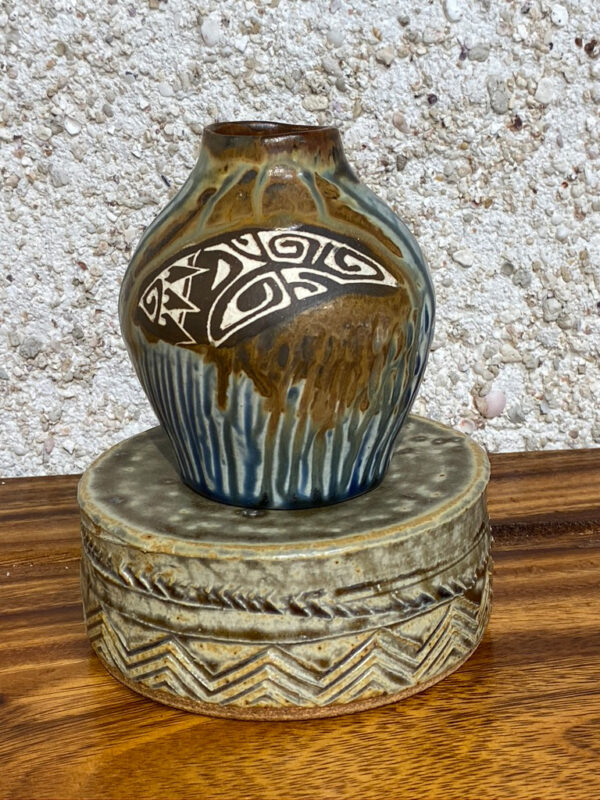 Small porcelain vase with hand carved Polynesian design and glazed with unique Huahine glazes found at the bottom of the lagoon.